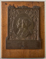 Plakietka płaskorzeźbiona z brązu przedstawiająca Romana i Elżbietę Potockich. Płaskorzeźba zamocowana na drewnianym podkładzie.