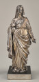 Srebrna figura Matki Boskiej na postumencie. Przód