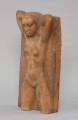 Wiosna - Ujęcie pod kątem z lewej strony; Płaskorzeźba przedstawia postać nagiej kobiety z nogami uciętymi na wysokości kolan. Głowa podparta z tyłu obiema rękoma, oczy zamknięte.