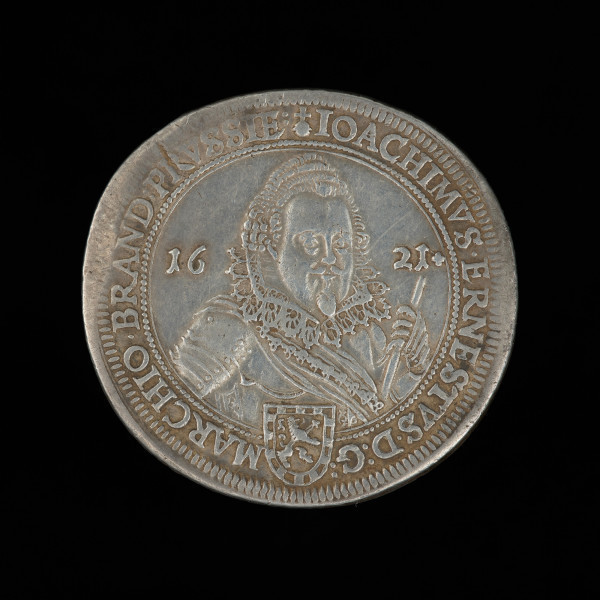 talar - Ujęcie awersu. Moneta z popiersiem władcy 3/4 w prawo na awersie.