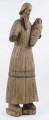E/1958/ML - Rzeźba z drewna lipowego, niepolichromowana. Przedstawia postać św. Józefa z Dzieciątkiem Jezus na ręku. Postać świętego w dwóch sukniach, jednej spodniej, długiej sięgającej do kostek, gładkiej oraz wierzchniej sięgającej do kolan, zakończonej falbaną. Prawa ręka świętego powyżej łokcia jest ułamana. Na lewej nieproporcjonalnie krótkiej ręce, Św. Józef trzyma Dzieciątko Jezus , spowite w powijaki i przewiązane tasiemkami. Twarz świętego pociągła, o wyrazistych rysach, długiej szpiczastej brodzie i opadających wąsach. Włosy sięgają karku. Postać zakomponowana na prostokątnej podstawie, o wys. 4 cm, lekko uszkodzonej. 

Konserwacja: 1985 r.