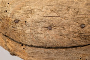 E/13/MRK/ML - Drewniaki dłubane, para. Długość 31 cm. Zrobione z dwóch kawałków drewna zbitych gwoździami. Z boku otwory do wiązania.