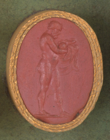 czerwona owalna gemma w grubym złotym obramowaniu; nagi starszy mężczyzna z kręconymi włosami i brodą, trzymający w ramionach niemowlę przykryte materiałem.