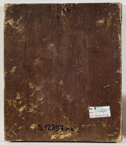 ikona w okładzie srebrnym złoconym, z wizerunkiem Bogurodzicy Radość Strapionych w całej postaci, z berłem w prawicy, stojącej wśród zwróconych do niej postaci, z towarzyszącymi aniołami, w zwieńczeniu półpostać Chrystusa Pantokratora; na lewym pasie bordiury św. Bazyli Męczennik 