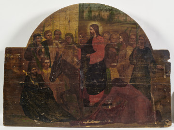 Wizerunek Chrystusa błogosławiącego prawicą,  witający tłum ściele odzież przez Chrystusem trzymając w ręce zielone liście palmy.